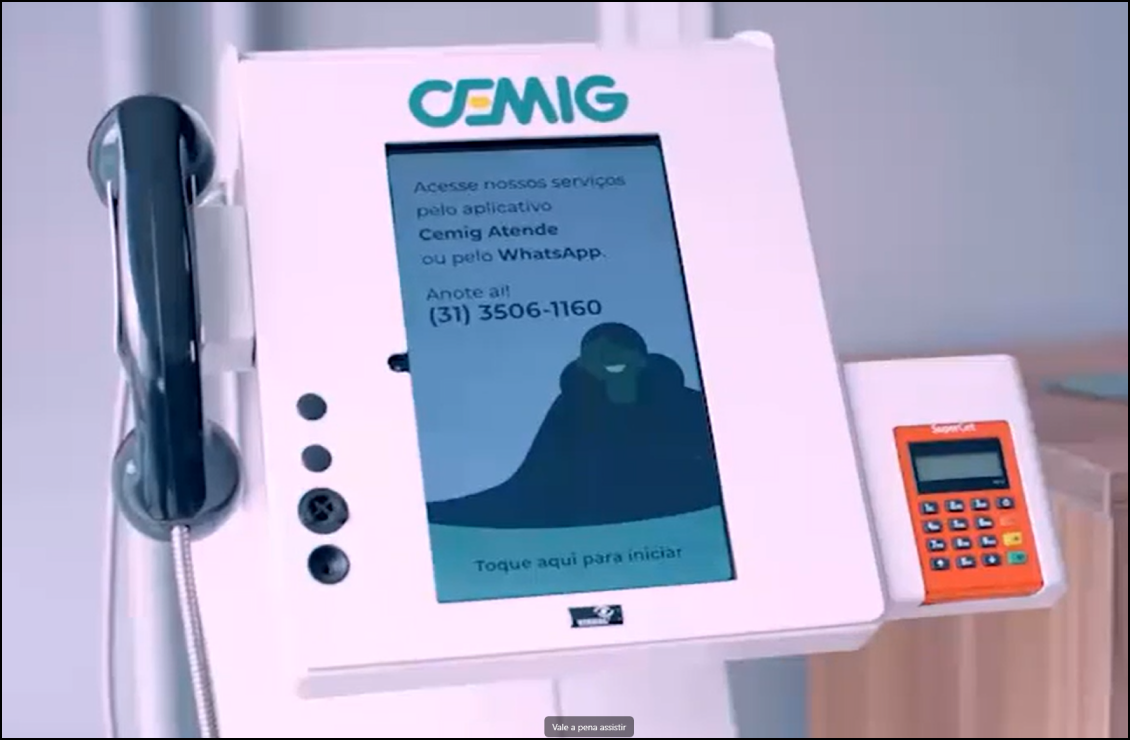 The self-service totem — deployed across agencies — and the looping screen idle I animated for it